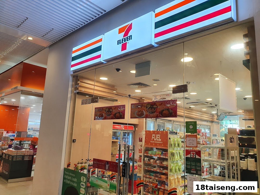 A brightly lit 7-Eleven convenience store entrance, showcasing its wide range of daily essentials.