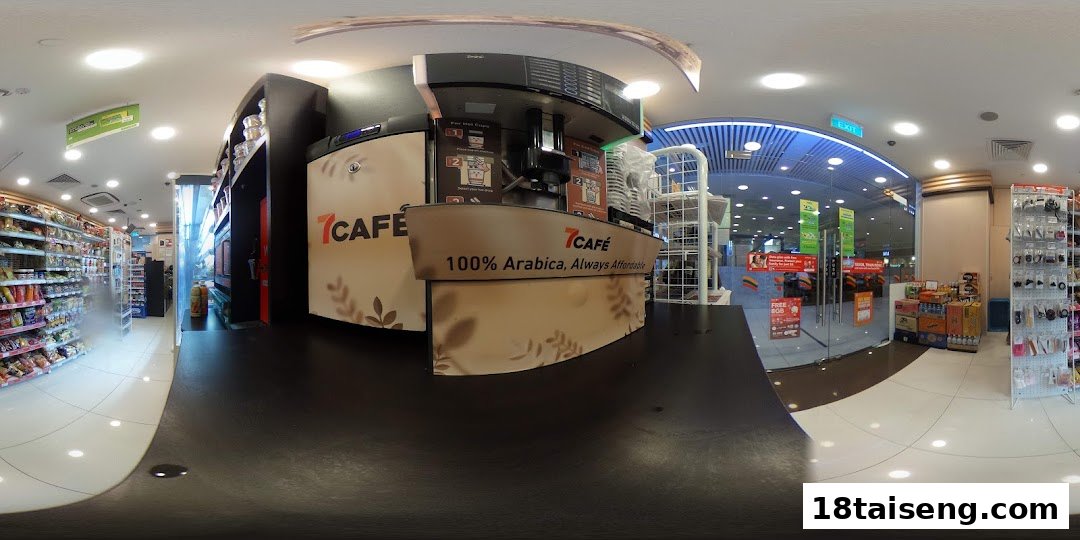 An interior view of a 7-Eleven convenience store, featuring a '7CAFE' coffee station and stocked shelves.