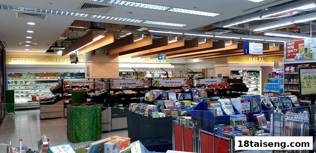 Interior view of FairPrice Tai Seng supermarket, showcasing fresh produce, packaged goods, and a variety of products.
