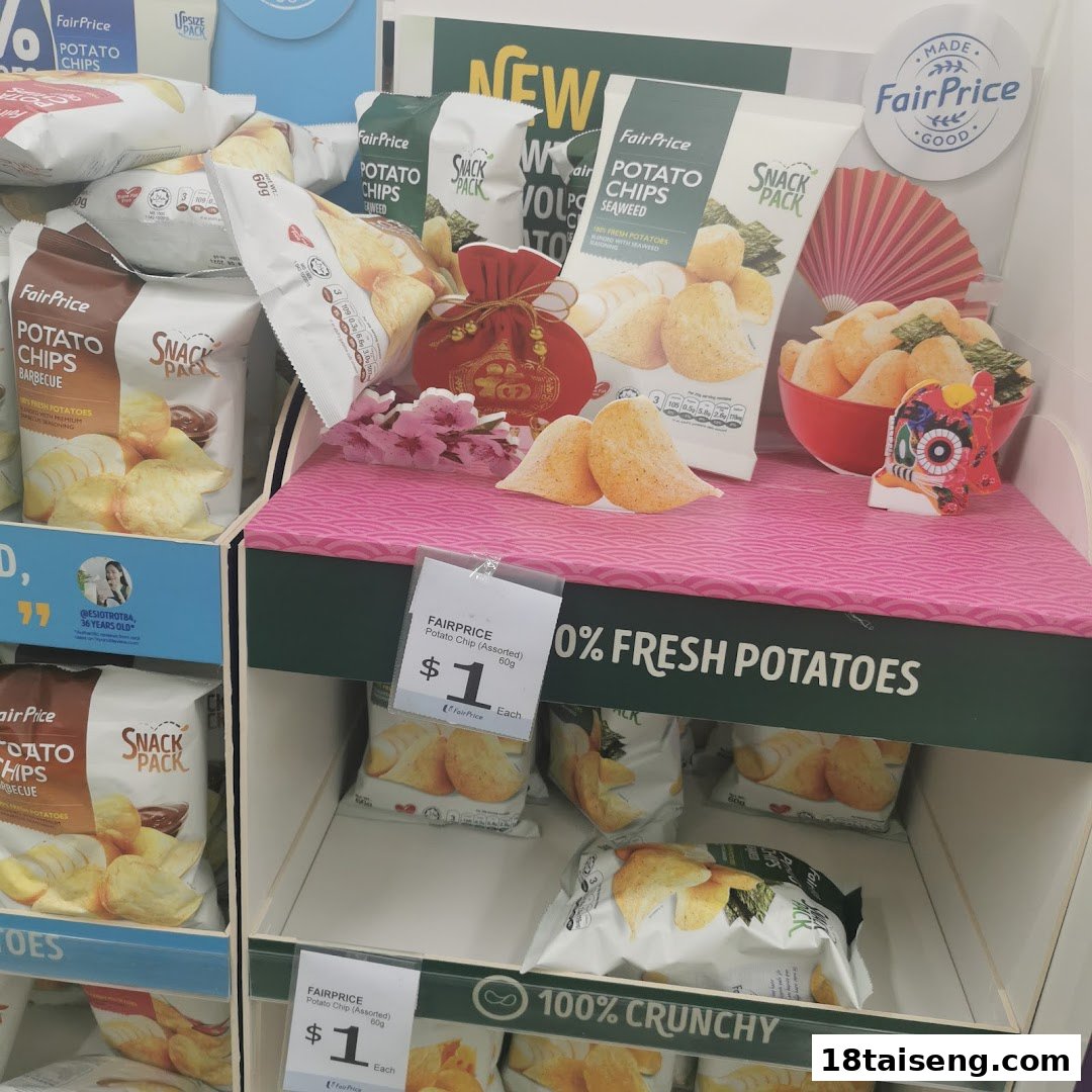 A retail display showcasing FairPrice potato chips, including new seaweed and barbecue flavors, with promotional pricing.