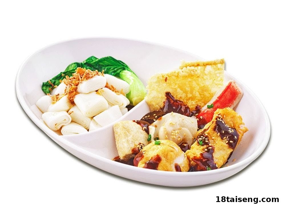 A divided plate featuring rice rolls with vegetables and assorted Yong Tau Foo items with sauce.