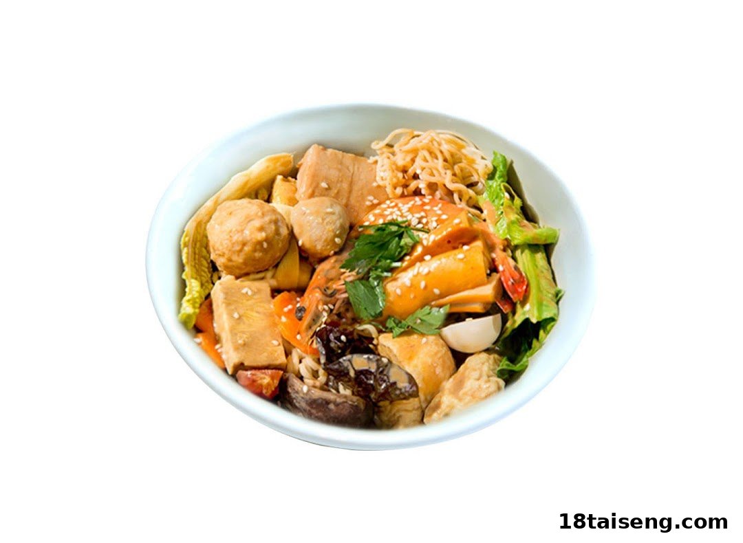 A vibrant bowl of Mala Tang featuring noodles, meatballs, vegetables, and other ingredients, garnished with sesame seeds.