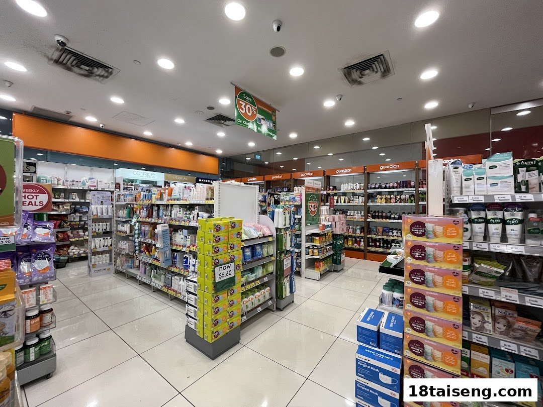An interior view of Guardian Health & Beauty, showcasing aisles filled with health, beauty, and personal care products.