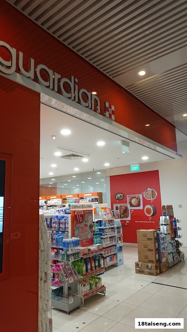 View of the Guardian Health & Beauty store entrance, showcasing various health and beauty products inside.