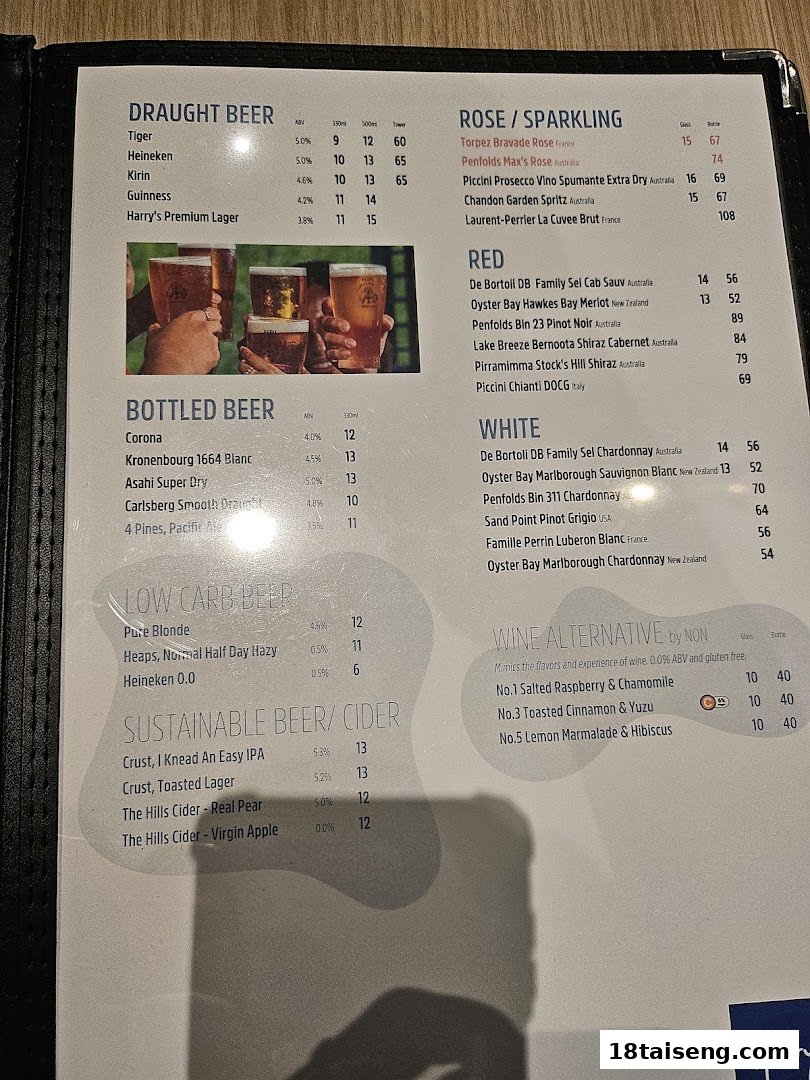 A detailed menu from Harrys Tai Seng, featuring a wide selection of beers, wines, and ciders.
