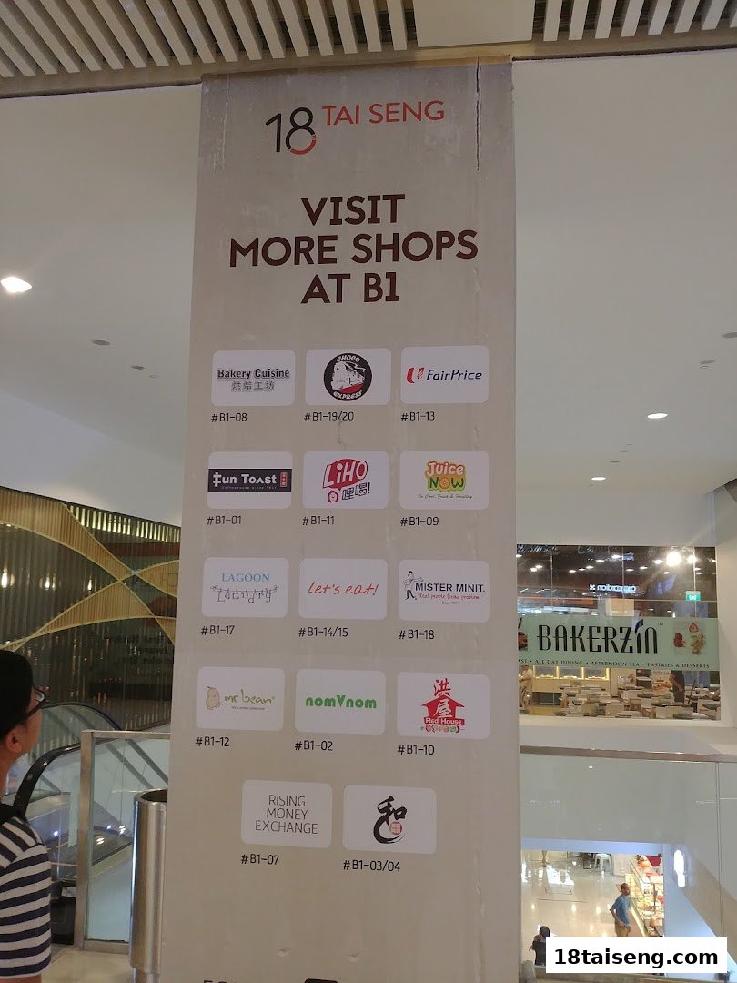 A directory pillar at 18 Tai Seng mall, listing various shops located on Basement 1.