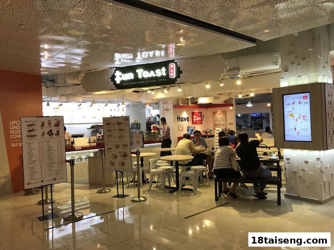 Customers enjoy traditional coffeehouse fare at Fun Toast, featuring a bright, inviting interior.