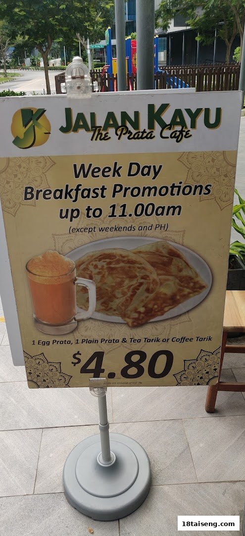 A promotional standee for Jalan Kayu The Prata Cafe's weekday breakfast promotion.