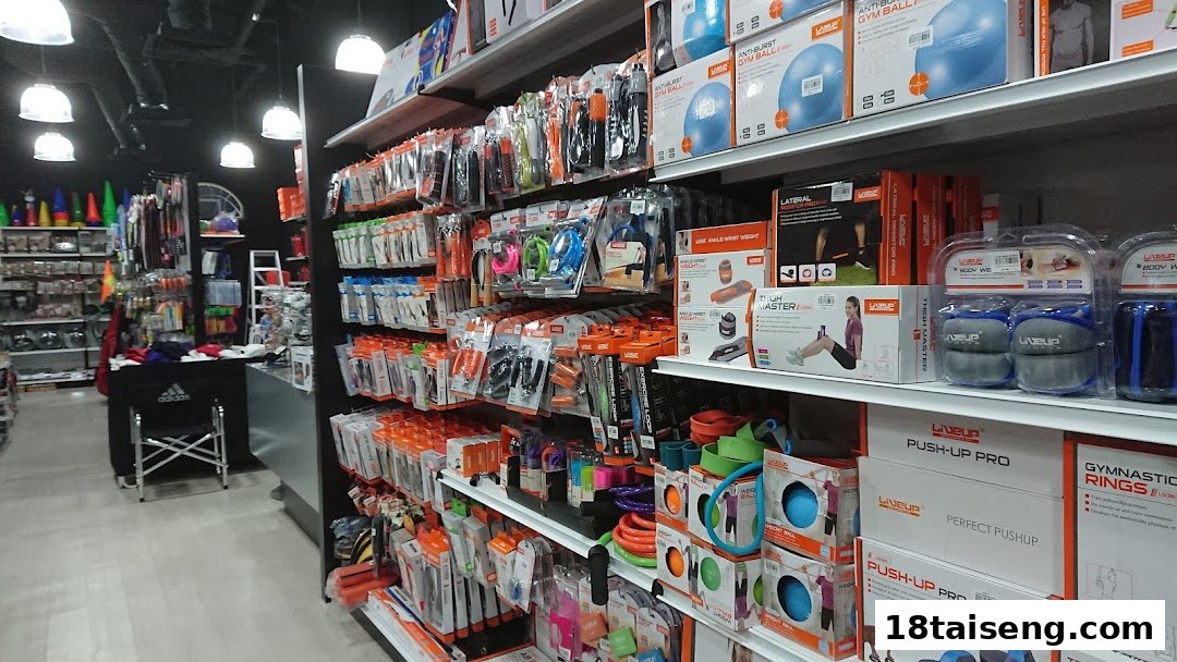 Interior view of Liang Seng Sports, showcasing shelves filled with various sports and fitness equipment.