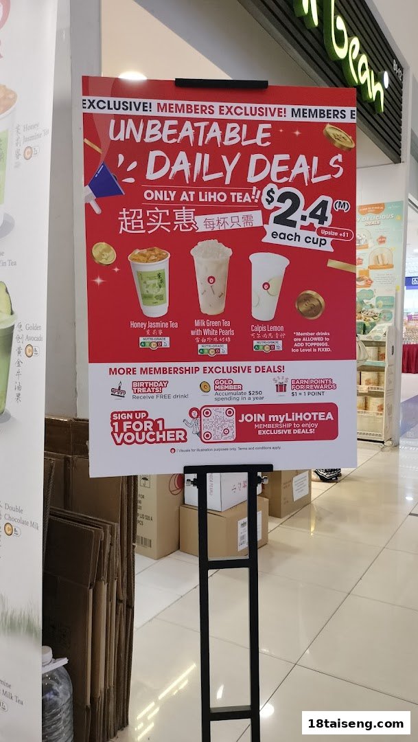 A promotional standee for LiHO TEA showcasing daily member-exclusive drink deals and membership benefits.