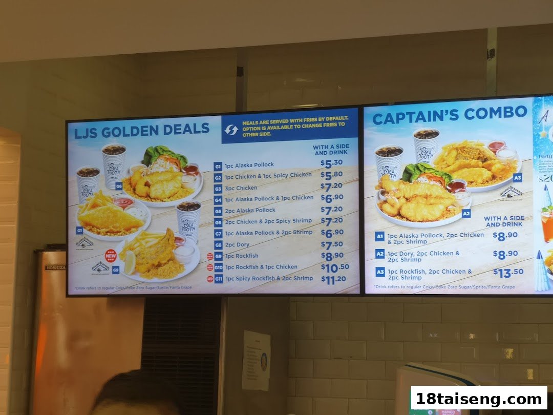 A digital menu board displaying Golden Deals and Captain's Combo meals at Long John Silver's.