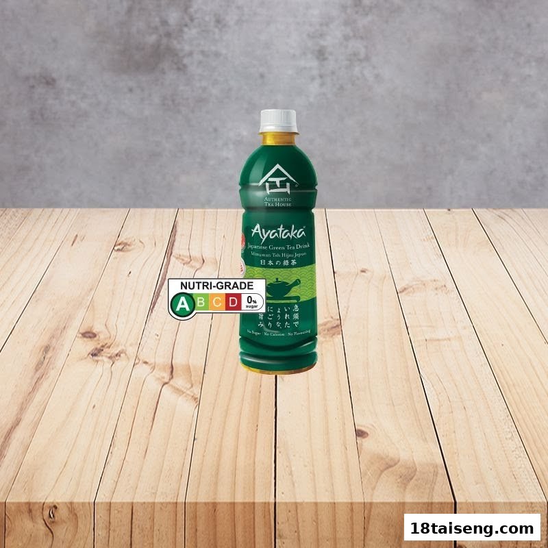 A bottle of Ayataka Japanese Green Tea Drink with a Nutri-Grade label on a wooden surface.