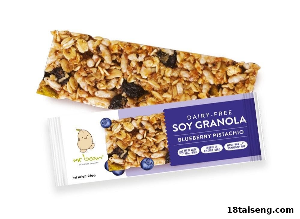 A Mr Bean Dairy-Free Soy Granola bar, Blueberry Pistachio flavor, with its packaging.