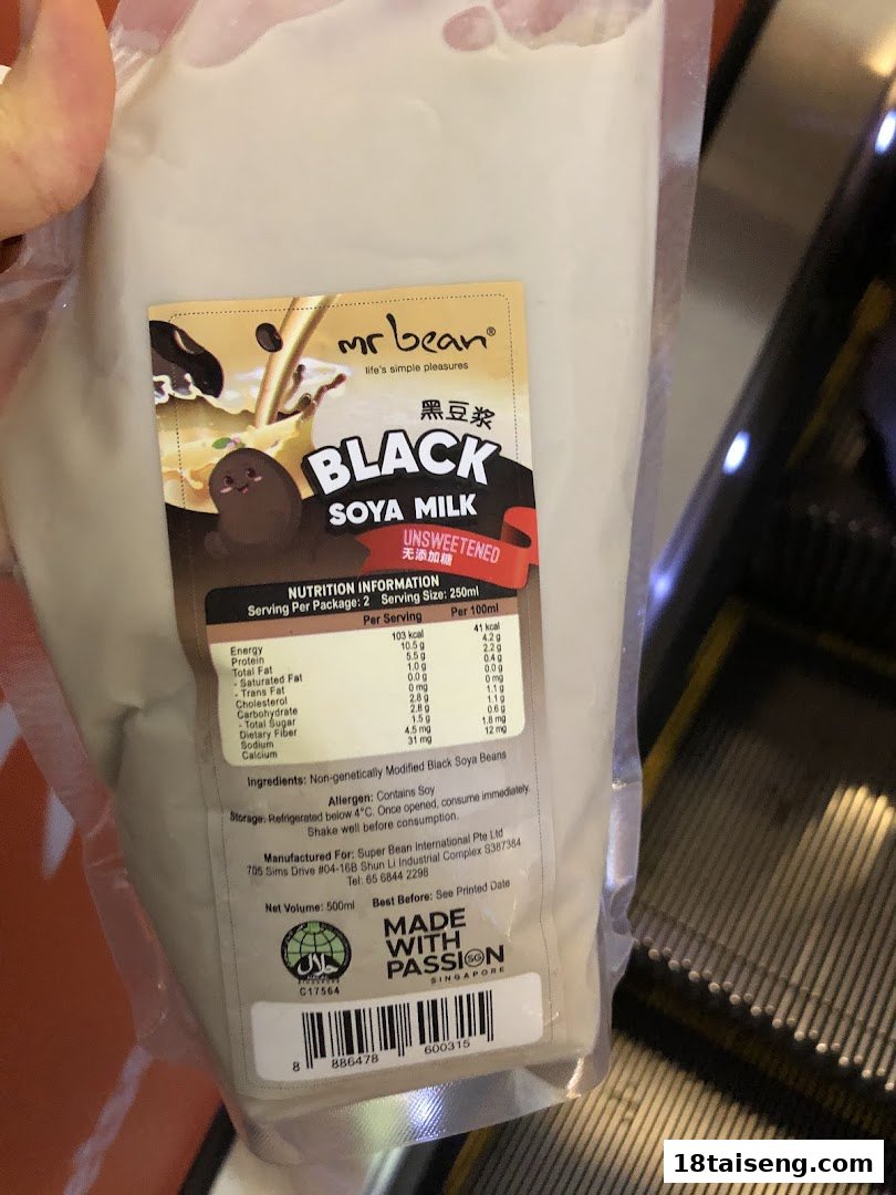 A pouch of Mr Bean Black Soya Milk, unsweetened, with nutrition information visible.