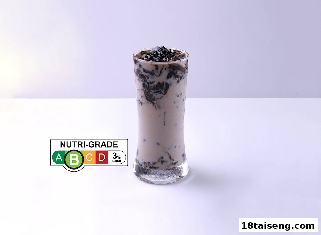 A tall glass of Mr Bean's soy-based drink with grass jelly, featuring a Nutri-Grade B label.