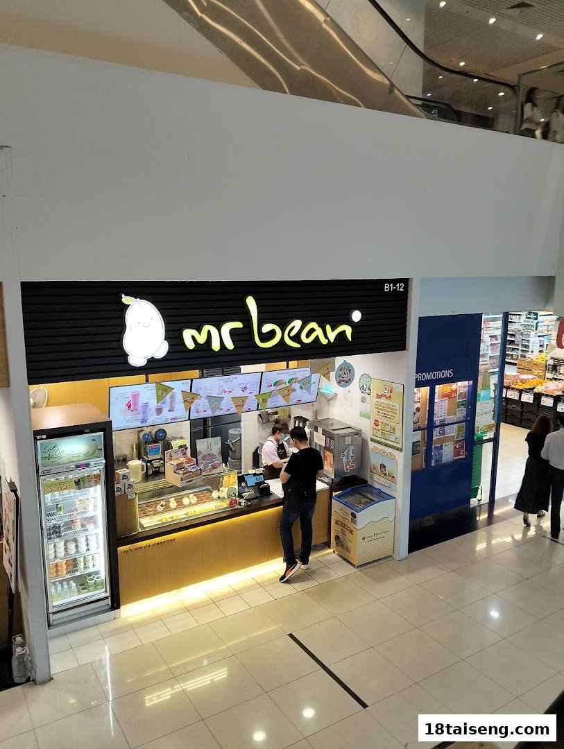 The Mr Bean shop front with a customer at the counter, showcasing its offerings in a mall.