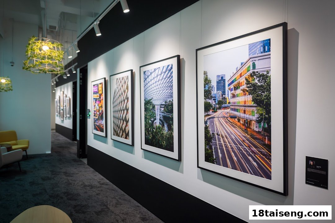 An interior view of Nikon Singapore showcasing large framed photographs on a gallery-style wall.