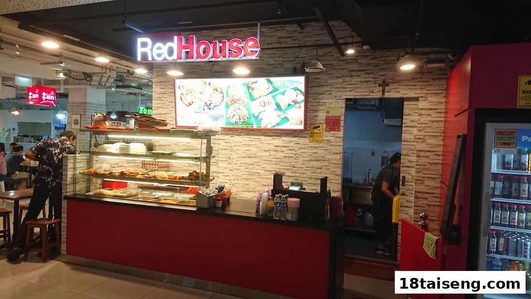 An interior view of Red House food stall, showcasing its counter, food display, and menu board.