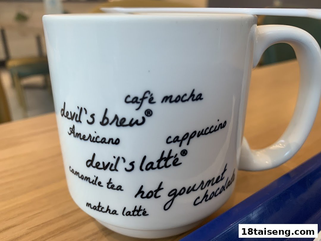A white mug from Rocky Master displaying various coffee and tea beverage names.