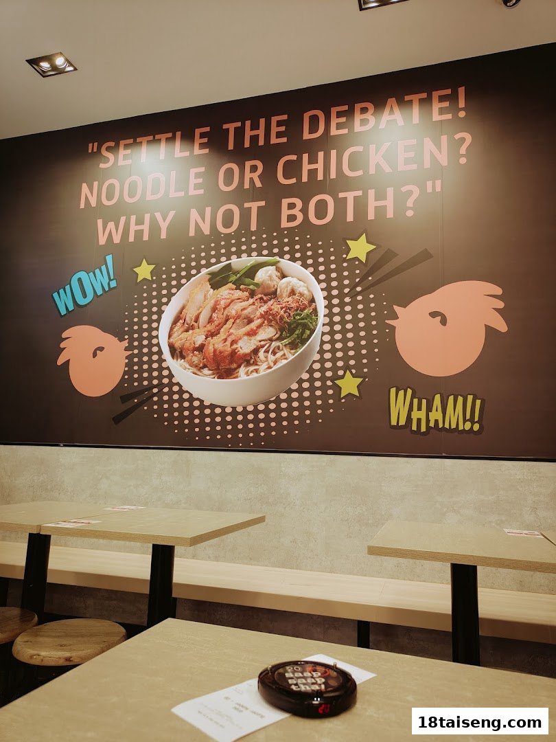 Interior view of Saap Saap Thai featuring a vibrant wall mural and dining tables.