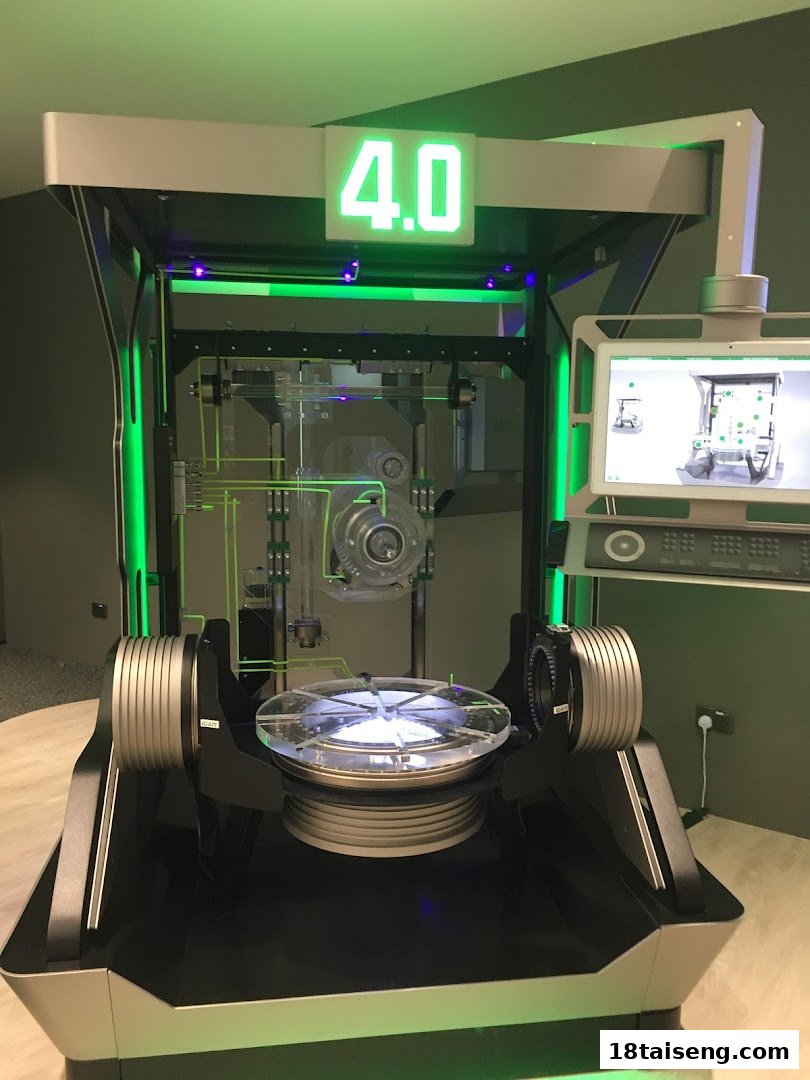 A high-tech industrial display with green lighting and a prominent '4.0' digital sign.