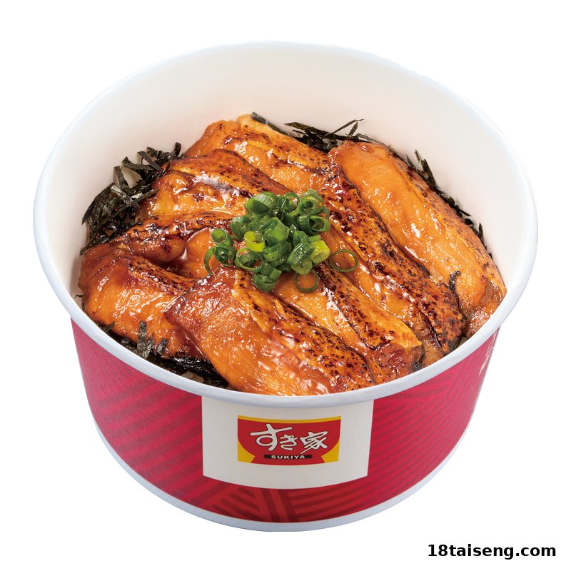 A close-up of a Sukiya donburi bowl featuring grilled fish, seaweed, and green onions.