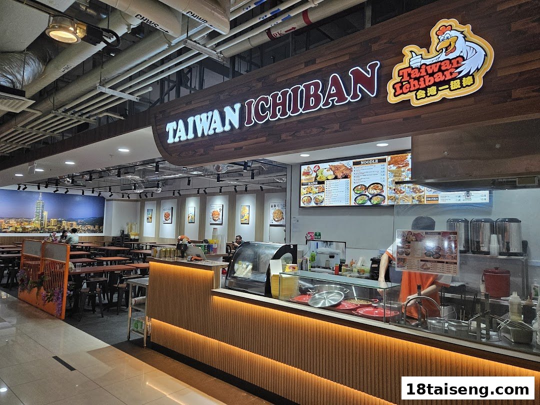 An interior view of Taiwan Ichiban, showing the counter, dining area, and digital menu board.