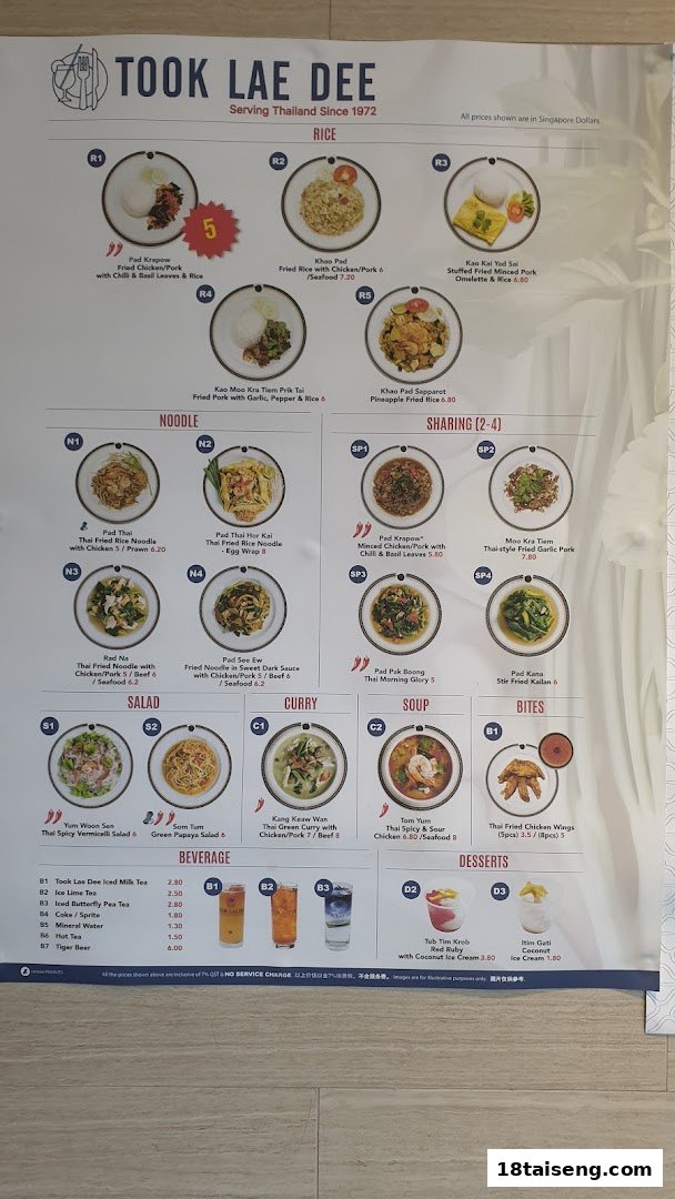 A detailed menu board for Took Lae Dee, showcasing a variety of Thai dishes and beverages.