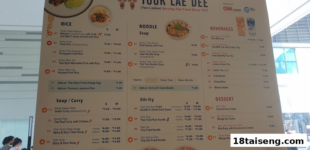 A detailed menu board for Took Lae Dee, featuring various Thai dishes and beverages.