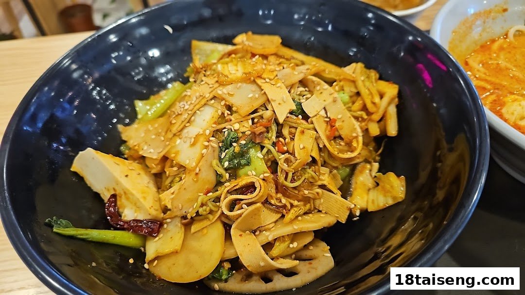 A vibrant bowl of spicy vegetarian stir-fry, featuring tofu, lotus root, and vegetables, topped with sesame seeds.