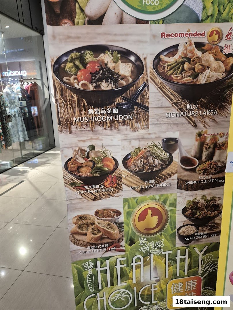 A vibrant display board showcasing various delicious vegetarian and vegan dishes.