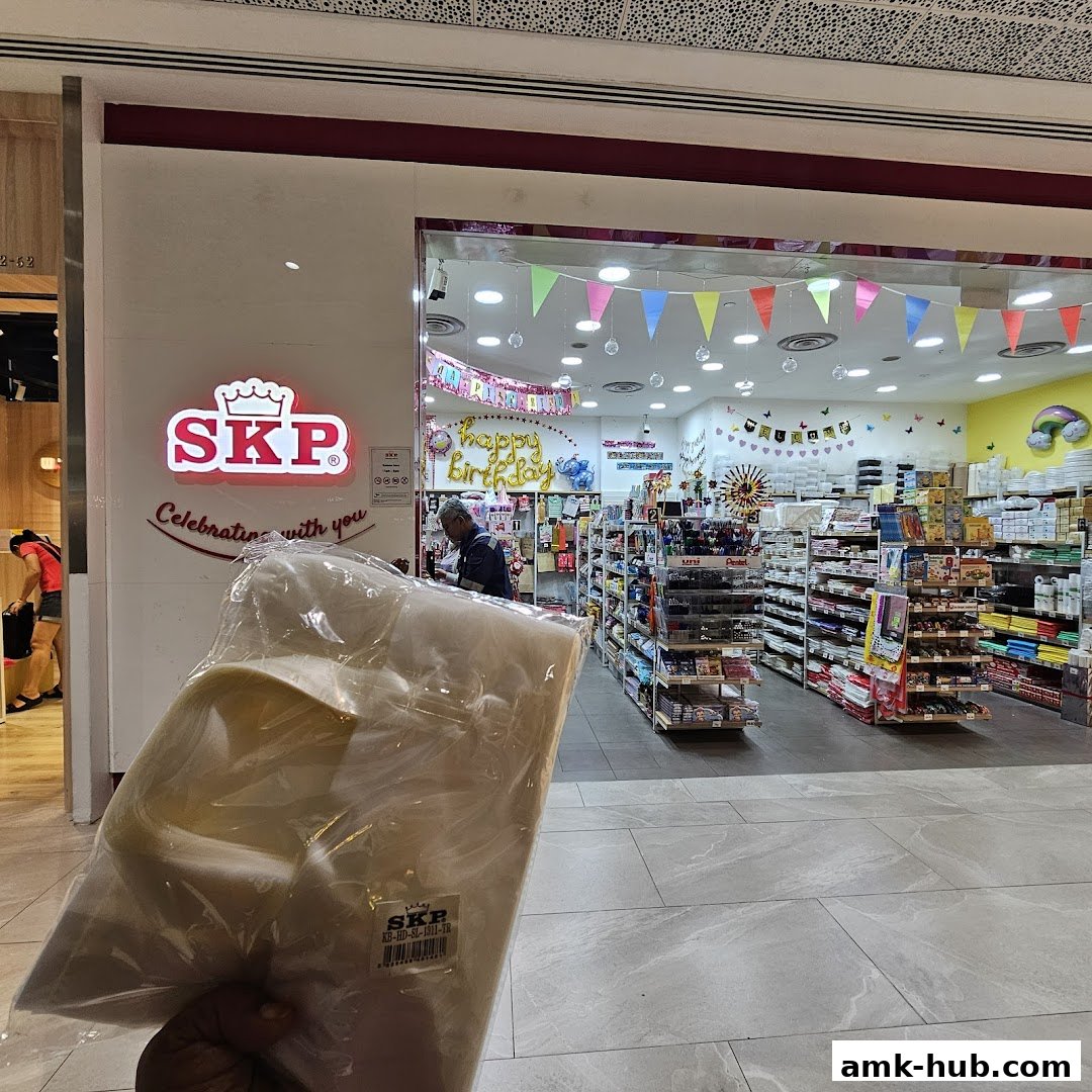 The entrance of SKP, a shop decorated with birthday banners and colorful flags.
