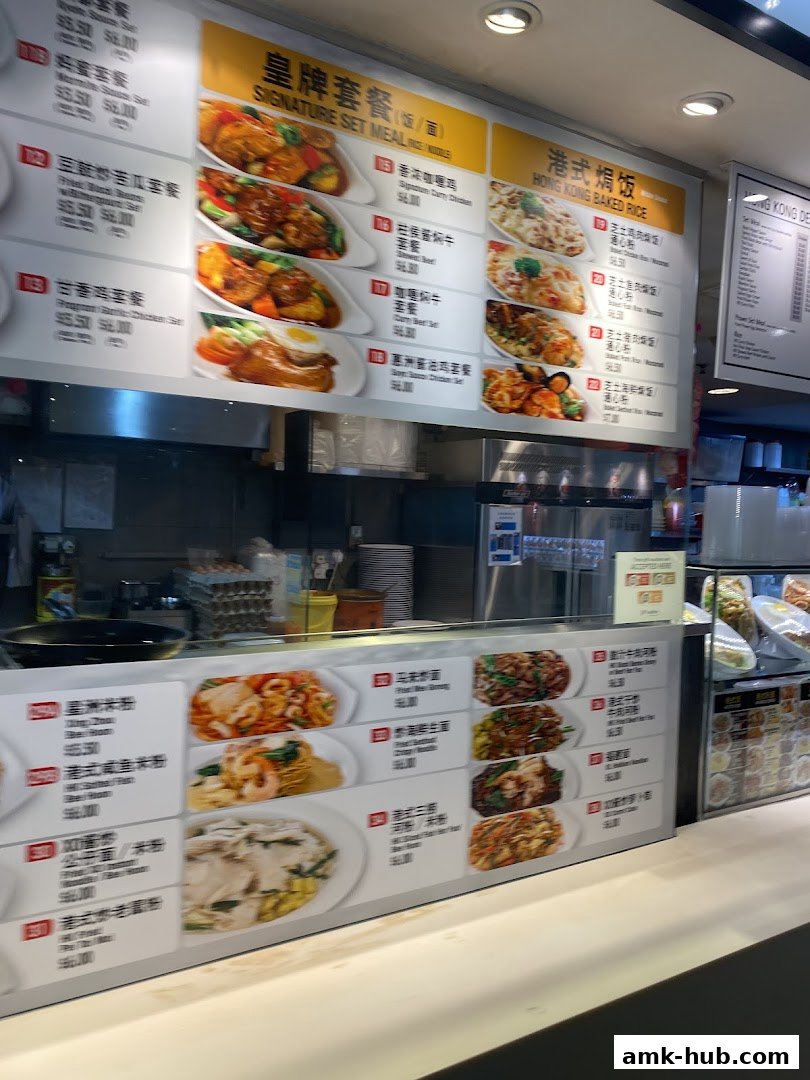 A menu board displaying various set meals and Hong Kong baked rice dishes with prices.