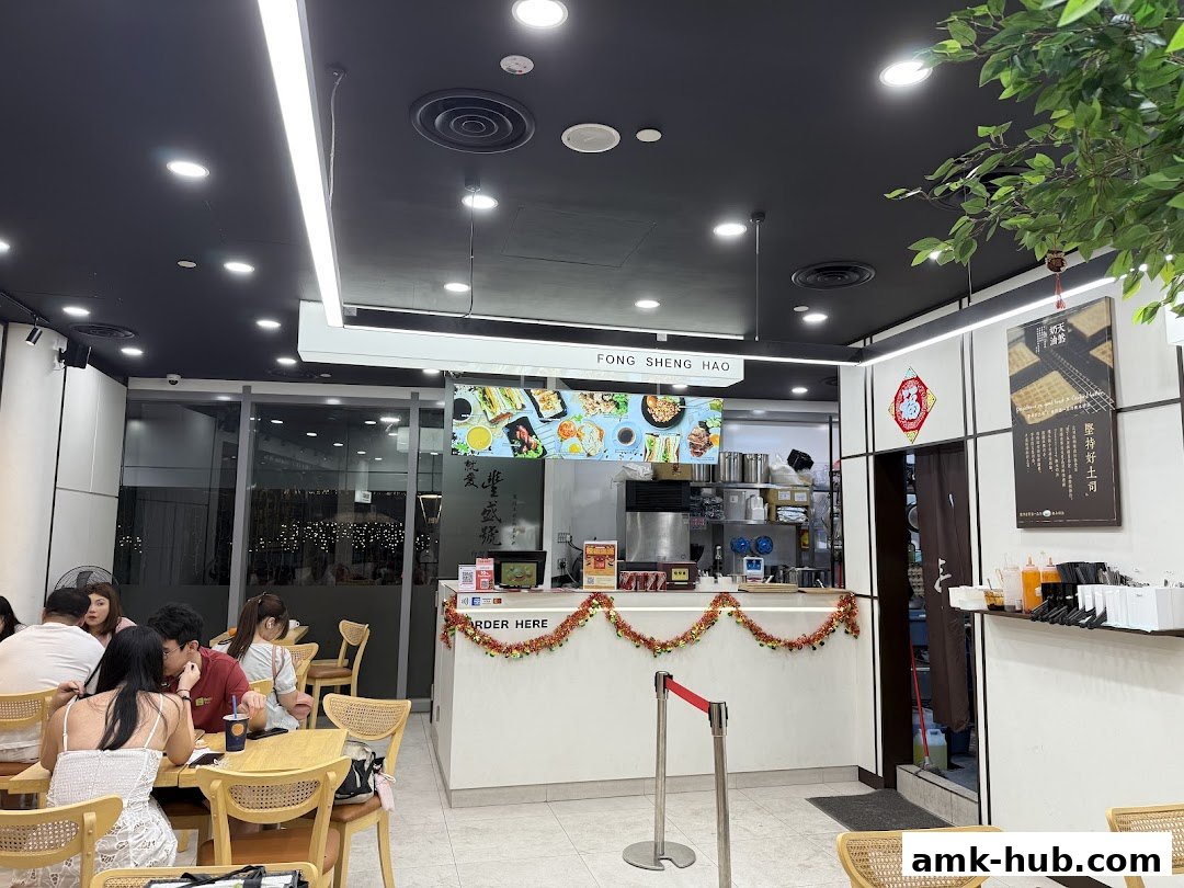 Interior view of Fong Sheng Hao AMK Hub with customers seated and a counter area.