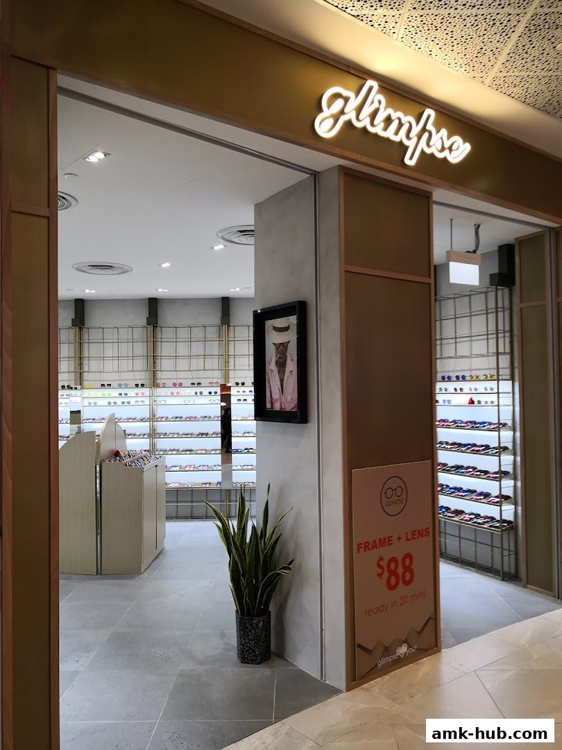 The entrance to Glimpse, an eyewear store, showcasing a wide selection of glasses.
