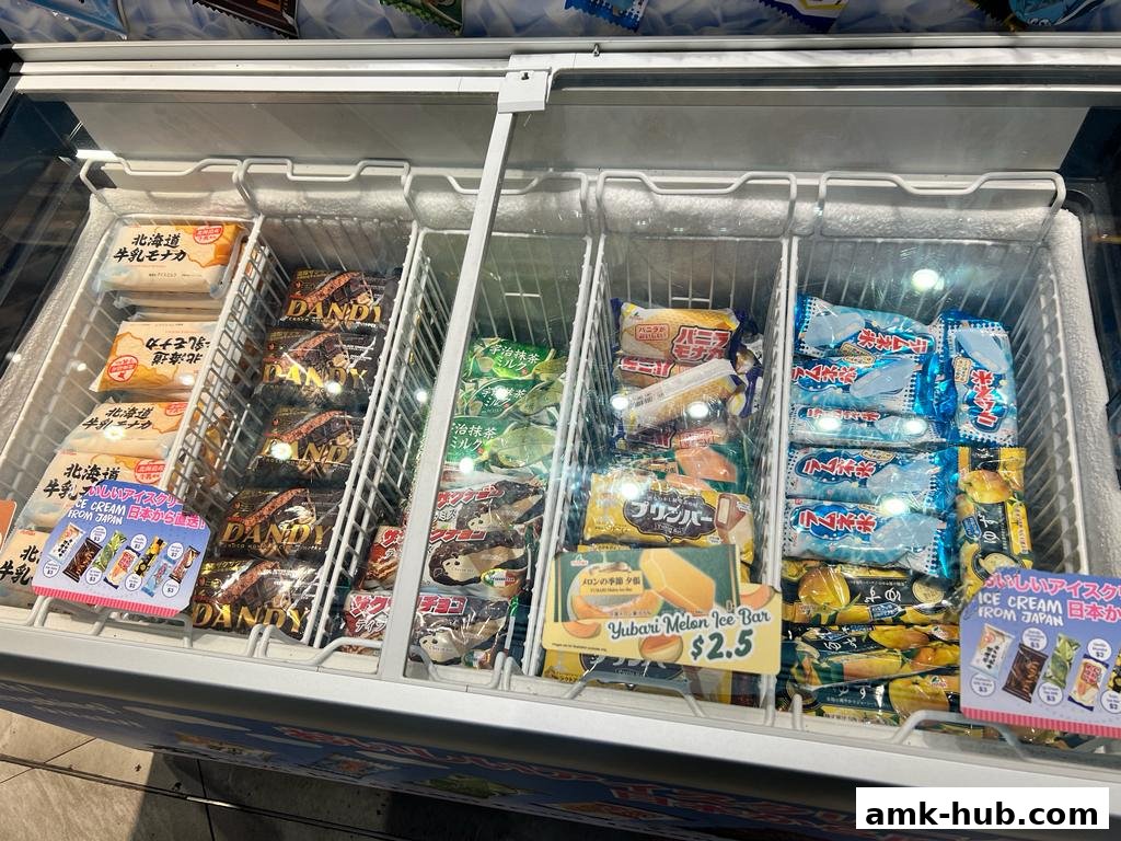 A freezer display filled with various Japanese ice cream bars and monaka.