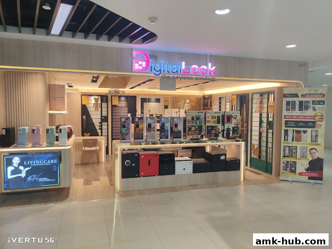 A modern shop front displaying various digital locks and doors, with a promotional banner.