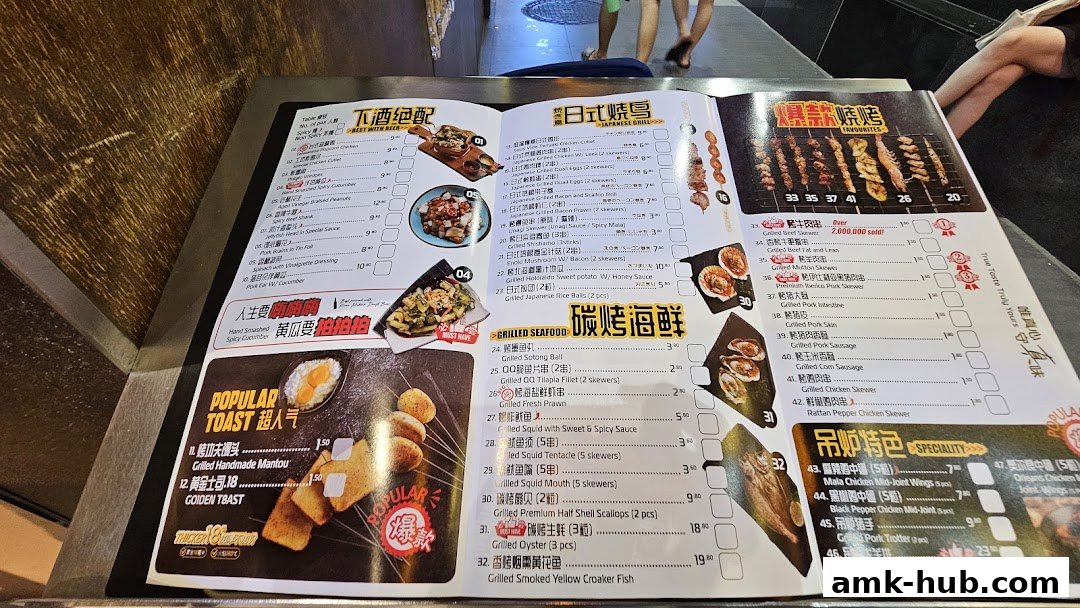 A menu from BBQ Box AMK Hub featuring various grilled skewers, seafood, and popular toast options.