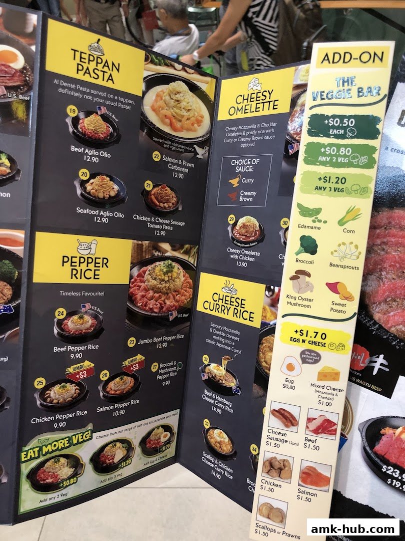 A menu from Pepper Lunch featuring Teppan Pasta, Pepper Rice, Cheesy Omelette, and Cheese Curry Rice dishes.