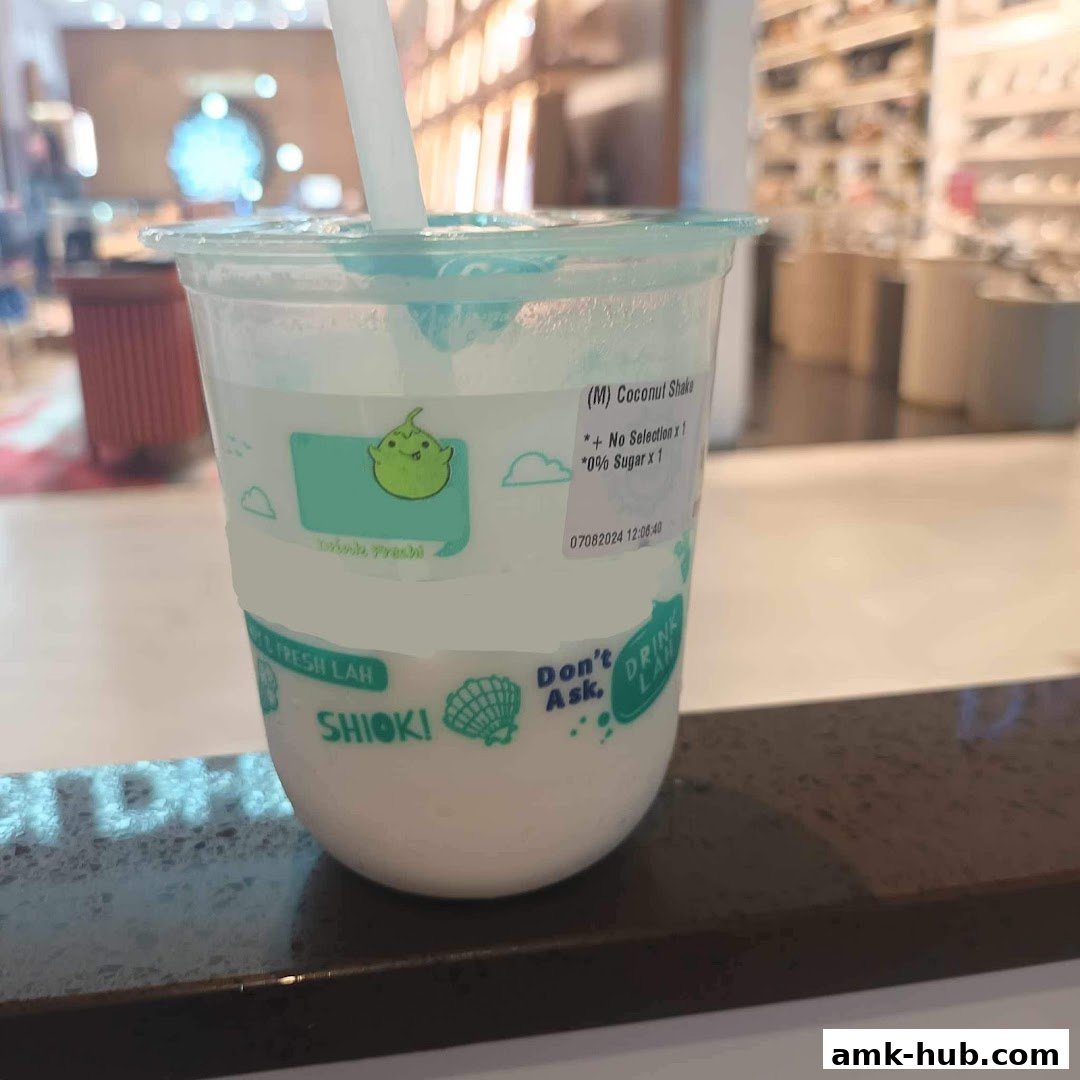 A close-up of a Mr. Coconut shake with customization details visible on the cup.