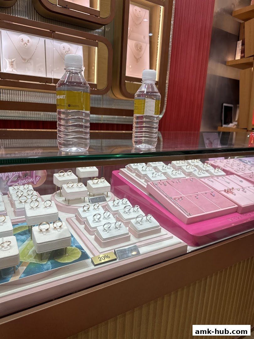 A display case filled with rings and necklaces at Goldheart Jewelry.