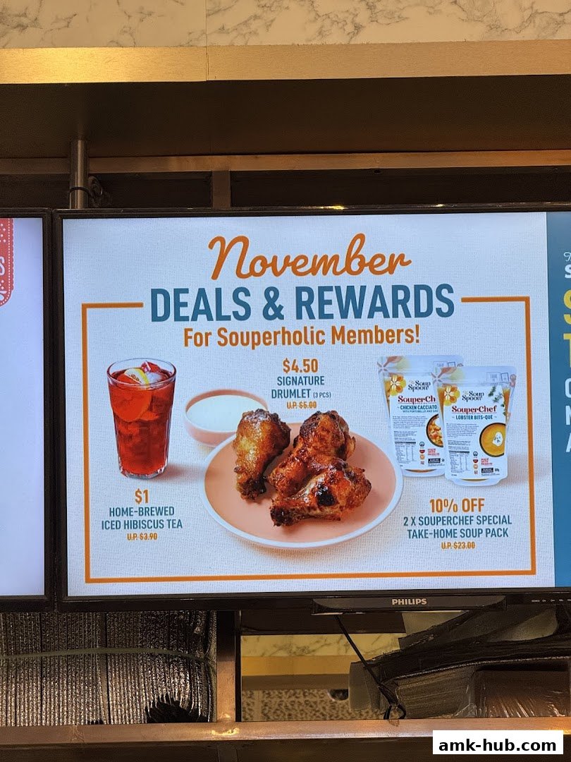 A digital menu board displays November deals and rewards for Souperholic members.