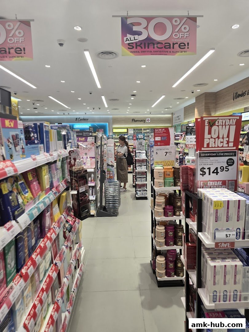 Interior view of a Watsons store with skincare products and promotional signage.