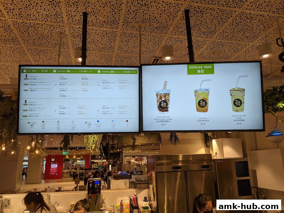 Digital menu boards displaying bubble tea options and popular items at CHICHA San Chen.