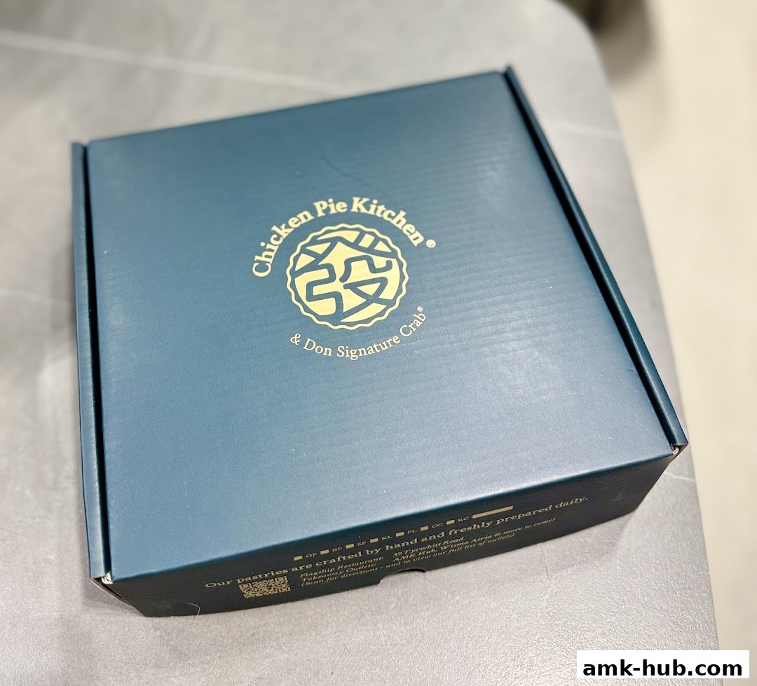 A closed teal box with the Chicken Pie Kitchen logo and text.