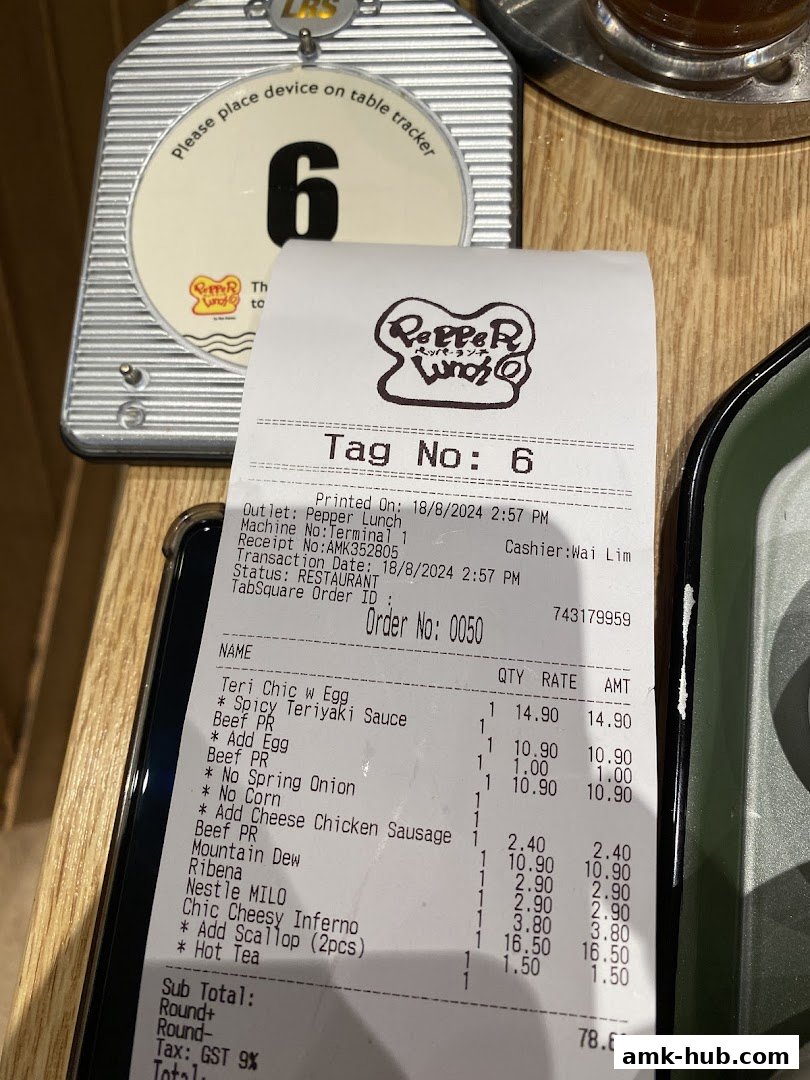 A receipt from Pepper Lunch showing a meal order and total cost.