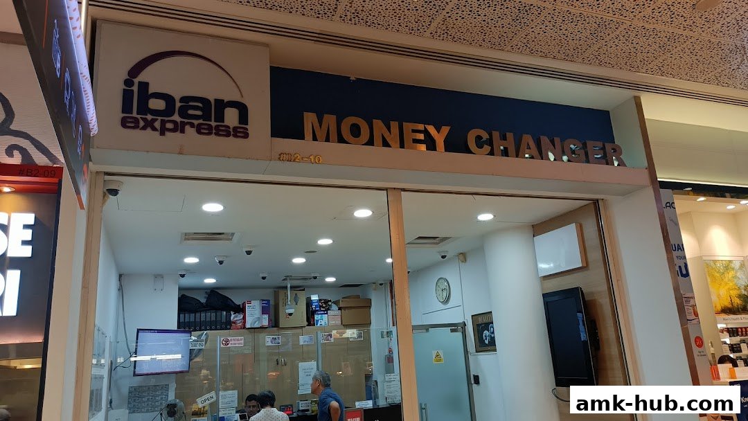 The storefront of Iban Express, a money changer, with its signage and entrance visible.