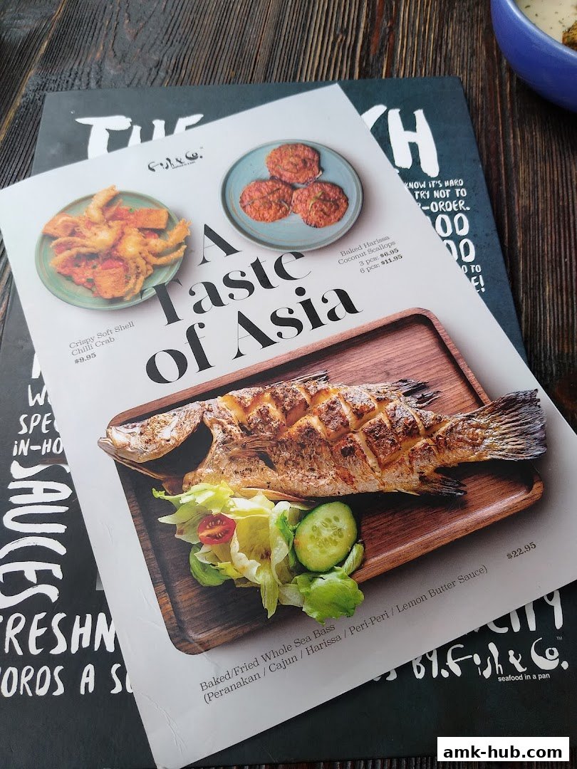 A menu from Fish Co. featuring a whole sea bass and other seafood dishes.