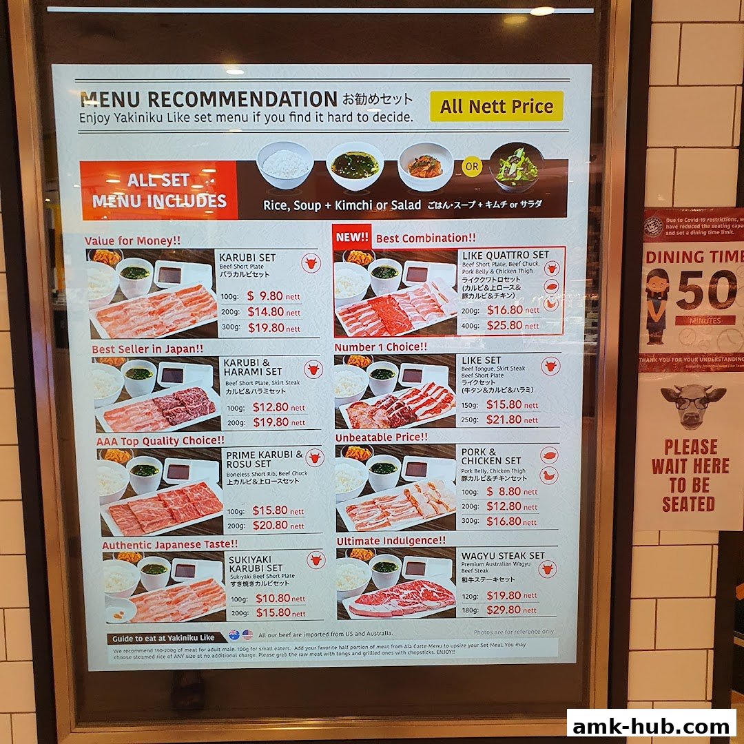 A menu board for Yakiniku Like, showcasing various meat sets and prices.