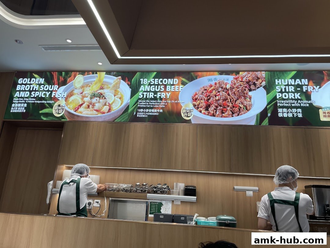 A food display showcasing three signature dishes from Xiang Xiang Hunan Cuisine.